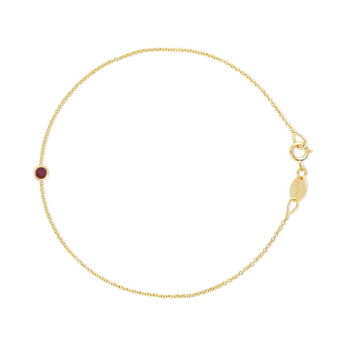 Gold bracelet with a ruby gemstone on a white background