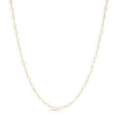 The Lily Bouquet Necklace on a white background. 