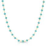 The Bluebell Bouquet Necklace on a white background. 