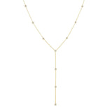 A Starstruck Diamond Lariat in yellow gold on a white background. 