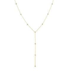 A Starstruck Diamond Lariat in yellow gold on a white background. 
