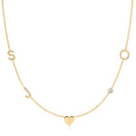 Gold necklace with a heart pendant on a white background