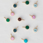 Color Pop Pendants in blue, pink, red and green against a light grey background. 