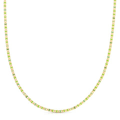 A Confetti Necklace - Green on a white background. 