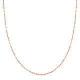 A Confetti Necklace - Pink on a white background. 