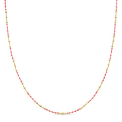 A Confetti Necklace - Pink on a white background. 