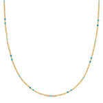 A Confetti Necklace - Blue on a white background. 