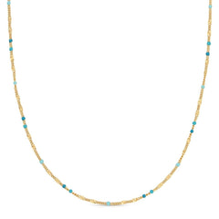 A Confetti Necklace - Blue on a white background. 
