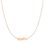 Petite Zodiac Necklace ‘aquarius’ in rose gold on a white background.