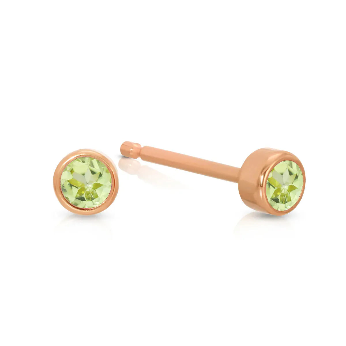 A pair of Birthstone Studs - Peridot (August) in rose gold on a white background.