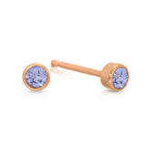 A pair of Birthstone Studs - Tanzanite (December) in rose gold on a white background.