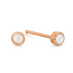 A pair of Birthstone Studs - Pearl (June) in rose gold on a white background.