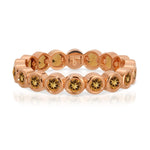 The Daisy Bouquet Ring in rose gold on a white background.