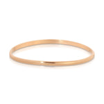 A Delicate Band in rose gold on a white background. 