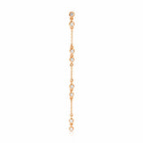 A Stardust Earring in rose gold on a white background. 