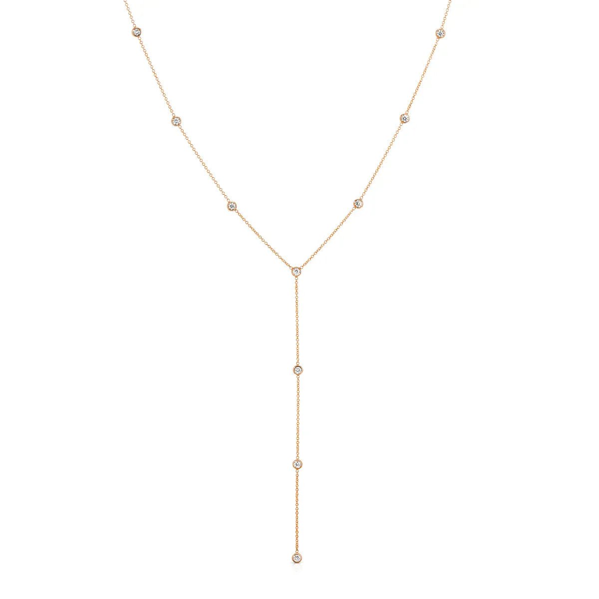 A Starstruck Diamond Lariat in rose gold on a white background. 
