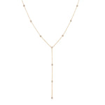 A Starstruck Diamond Lariat in rose gold on a white background. 