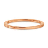 A Flat Ring in rose gold on a white background. 