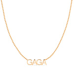 A GAGA Necklace in rose gold on a bead chain on a white background.