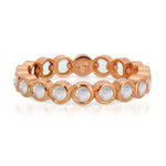 The Gardenia Bouquet Ring in rose gold on a white background.
