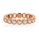 The Gardenia Bouquet Ring in rose gold on a white background.