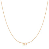 Petite Zodiac Necklace ‘leo’ in rose gold on a white background.