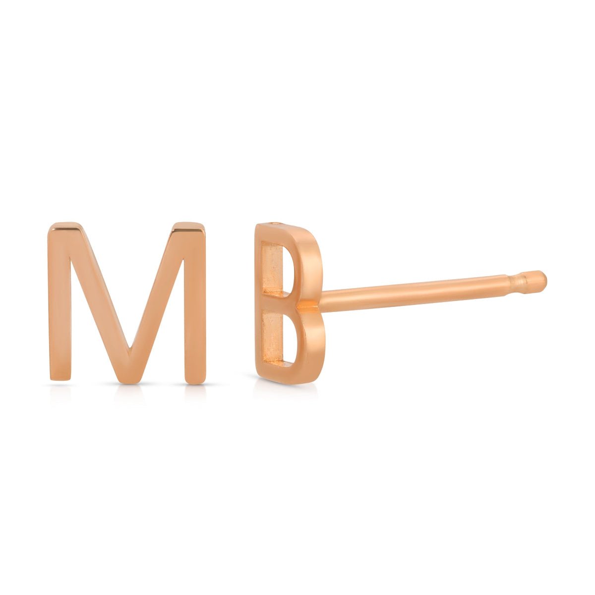 Two rose gold letter stud earrings, one engraved with the letter 'M' and the other with the letter 'B'.
