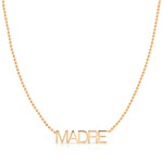 A Madre Necklace in rose gold on a bead chain on a white background.