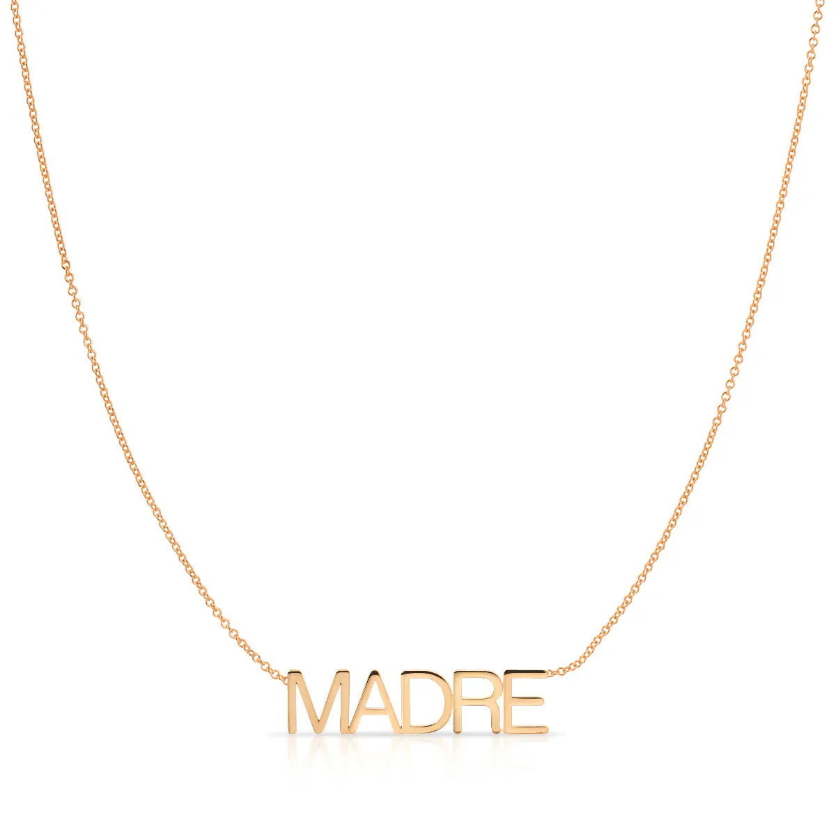 A Madre Necklace in rose gold on a cable chain on a white background.