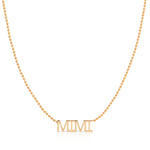 A MIMI Necklace in rose gold on a bead chain on a white background.