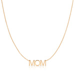 A MOM Necklace in rose gold with a cable chain on a white background. 
