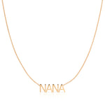 A NANA Necklace in rose gold on a cable chain on a white background.