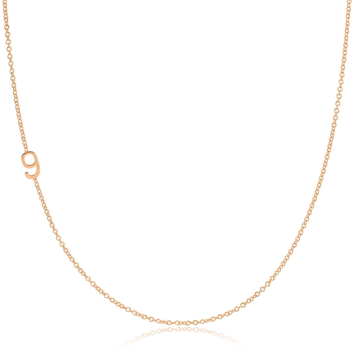 A rose gold 14k Gold Asymmetrical Number Necklace - 9 on a white background. 