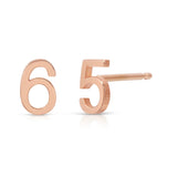 A pair of rose gold 14K Gold Number Studs in 6 and 5 on a white background. 