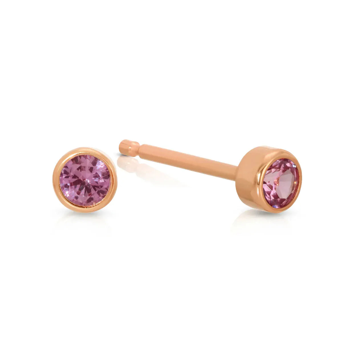 A pair of Birthstone Studs - Pink Tourmaline (October) in rose gold on a white background.