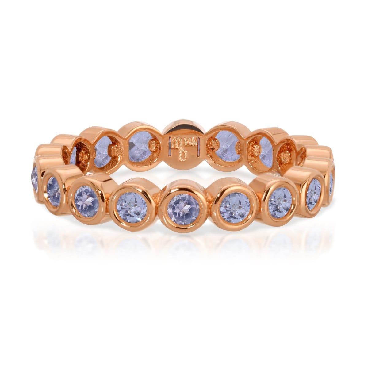 The Periwinkle Bouquet Ring in rose gold on a white background.