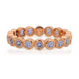 The Periwinkle Bouquet Ring in rose gold on a white background.