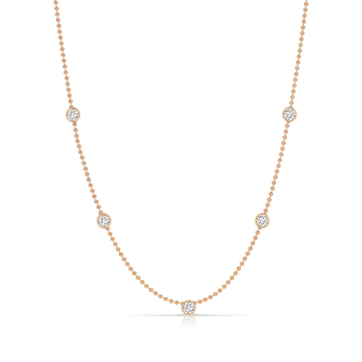 Quintet Diamond Layering Necklace in rose gold on a white background. 