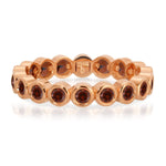 The Rose Bouquet Ring in rose gold on a white background.