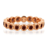 The Rose Bouquet Ring in rose gold on a white background.