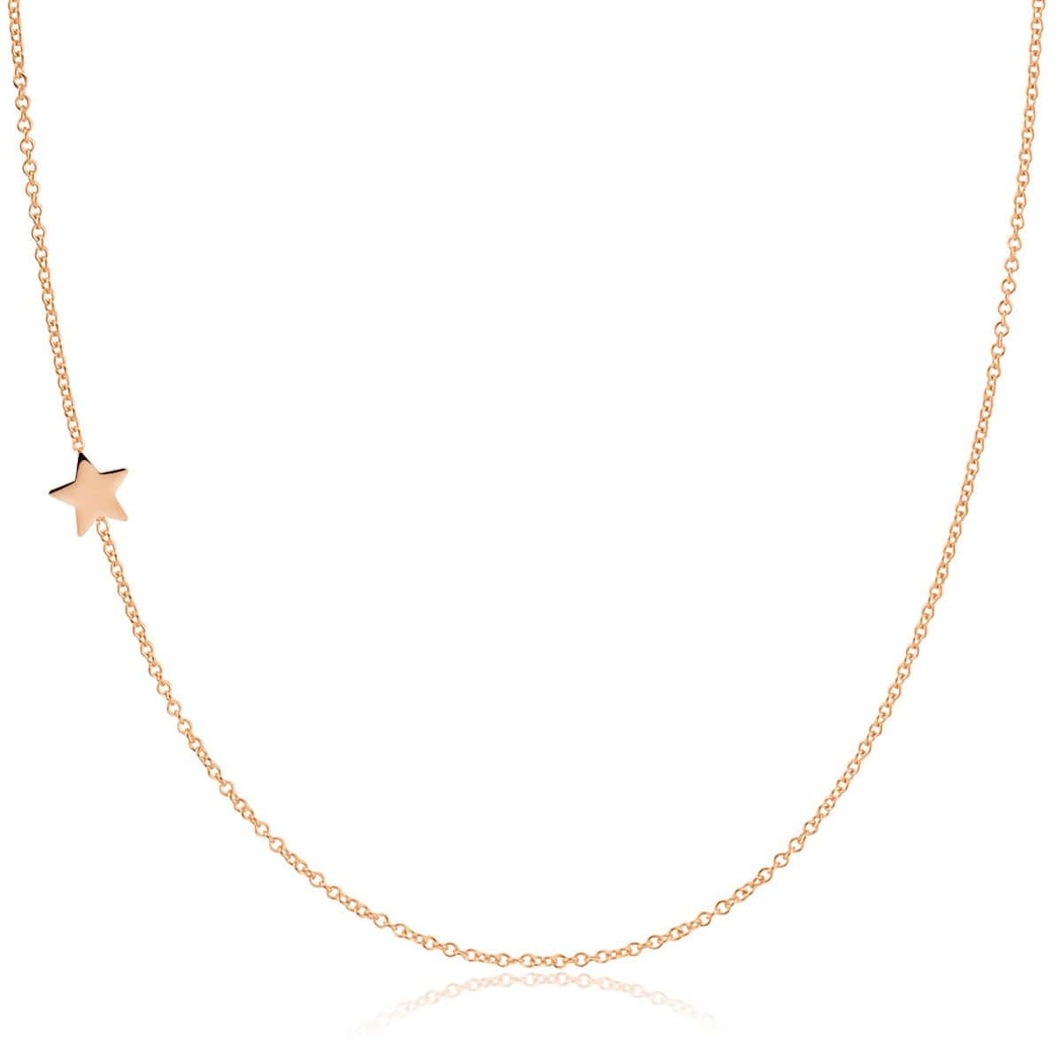 A rose gold 14k Gold Asymmetrical Charm Necklace - Star with a cable chain on a white background. 