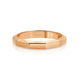 A Tenfold Ring in rose gold on a white background. 