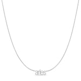 Petite Zodiac Necklace ‘aries’ in white gold on a white background.