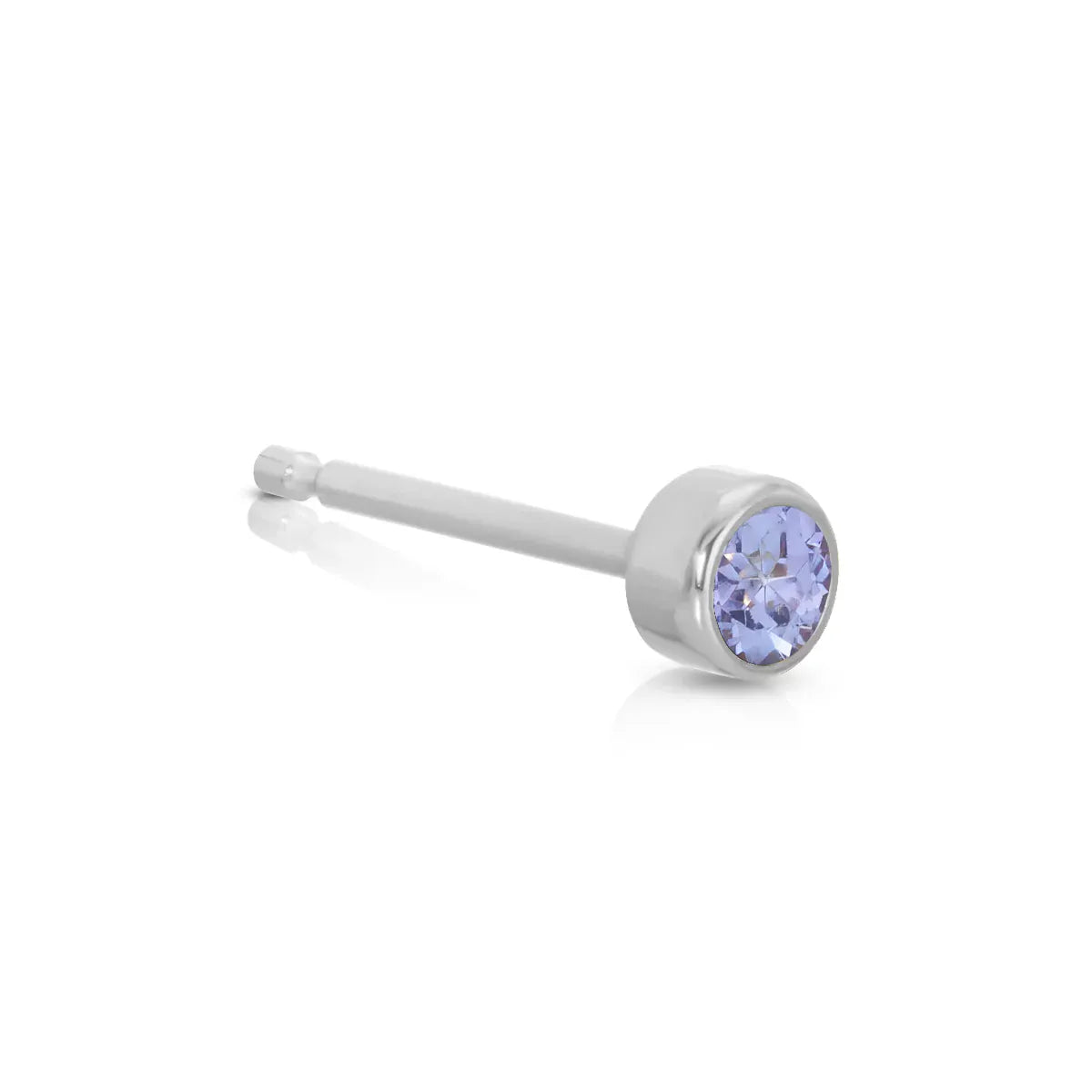 A Birthstone Stud - Tanzanite (December) in white gold on a white background.