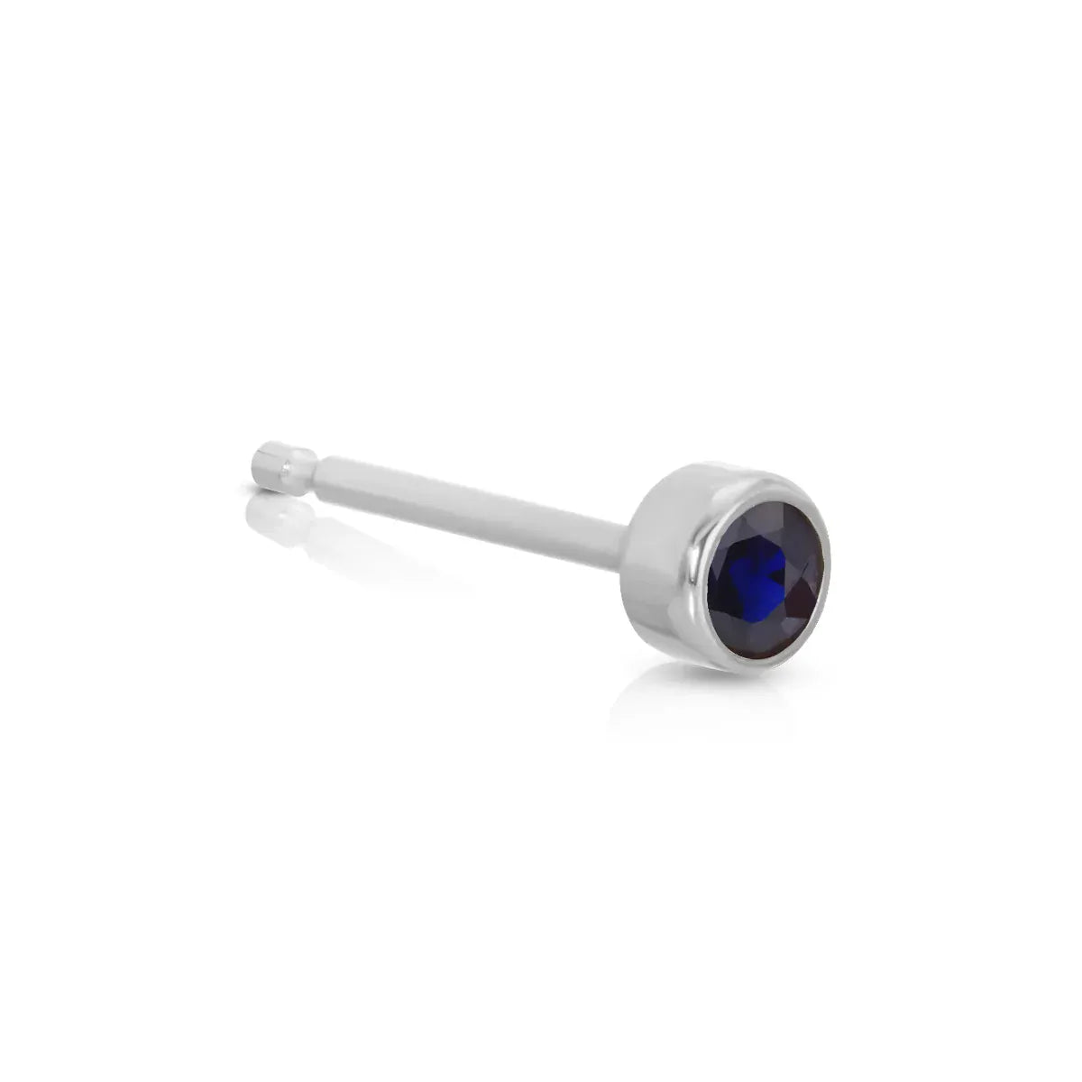 A Birthstone Stud - Sapphire (September) in white gold on a white background.