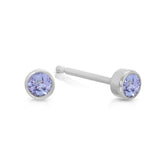 A pair of Birthstone Studs - Tanzanite (December) in white gold on a white background.