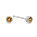 A pair of Birthstone Studs - Citrine (November) in white gold on a white background.