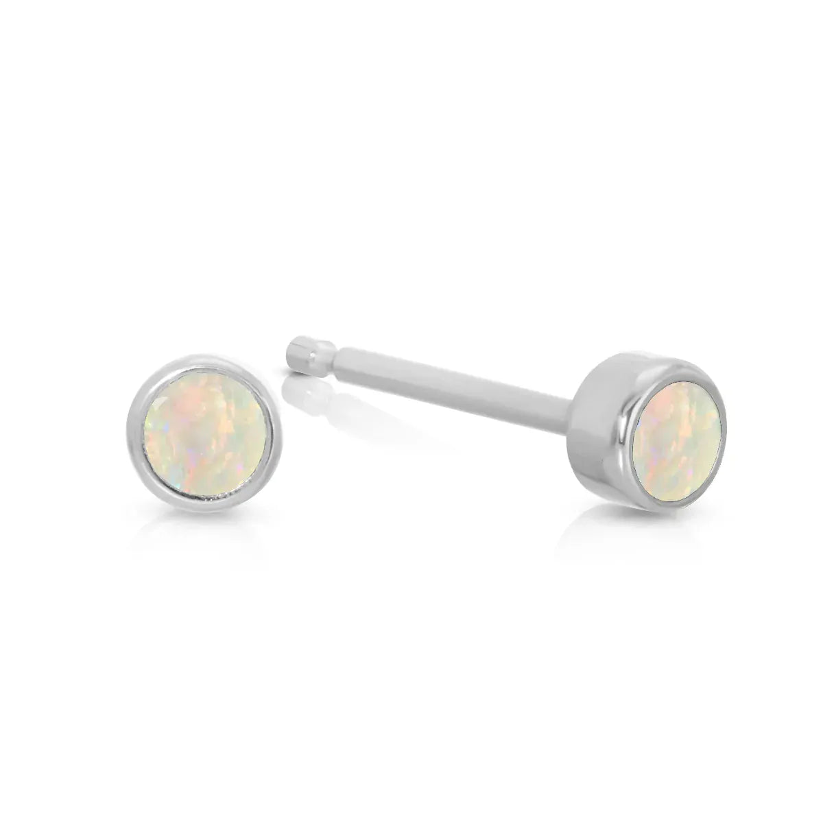 A pair of Birthstone Studs - Opal (October) in white gold on a white background.