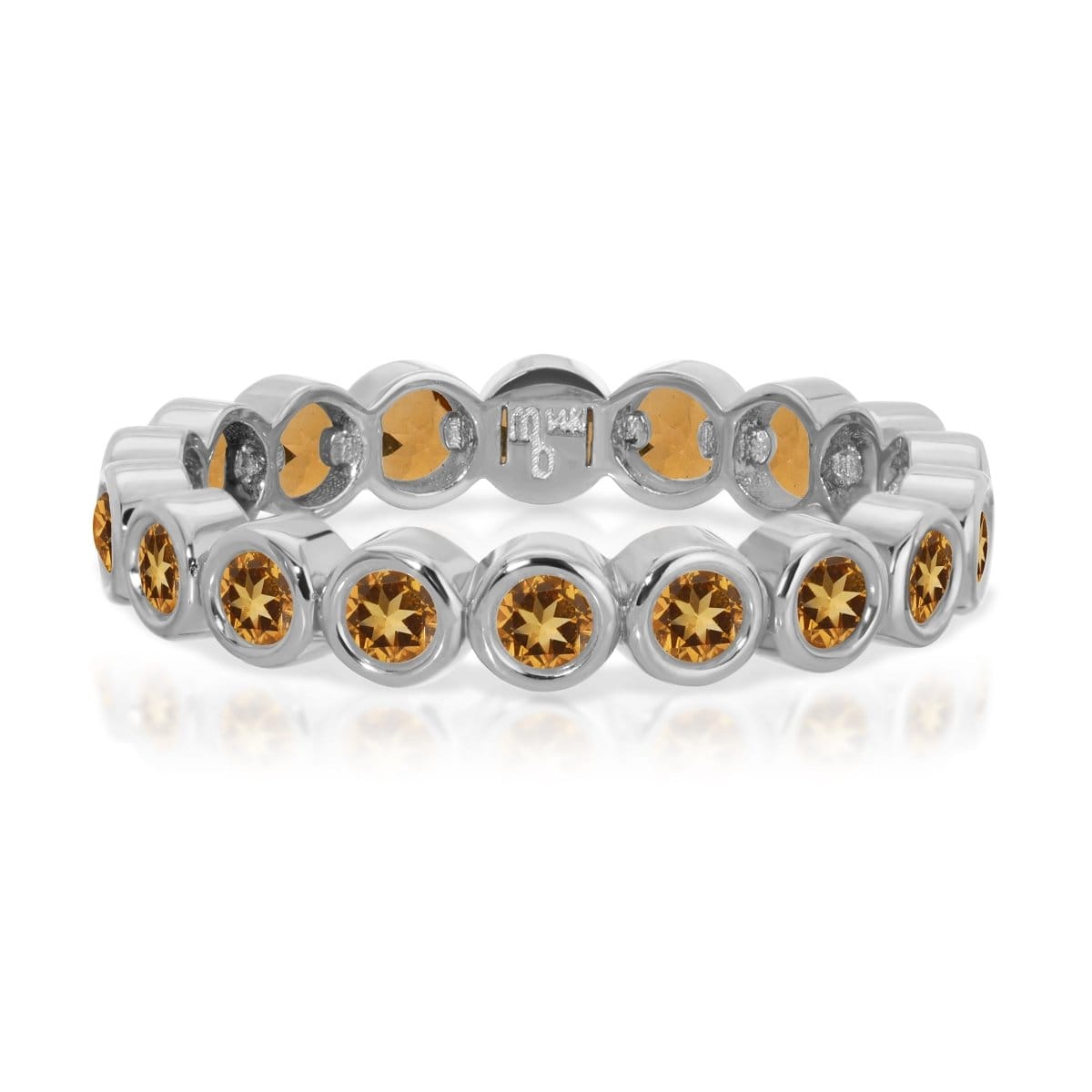 The Daisy Bouquet Ring in white gold on a white background.