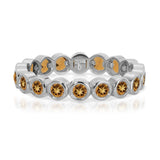 The Daisy Bouquet Ring in white gold on a white background.